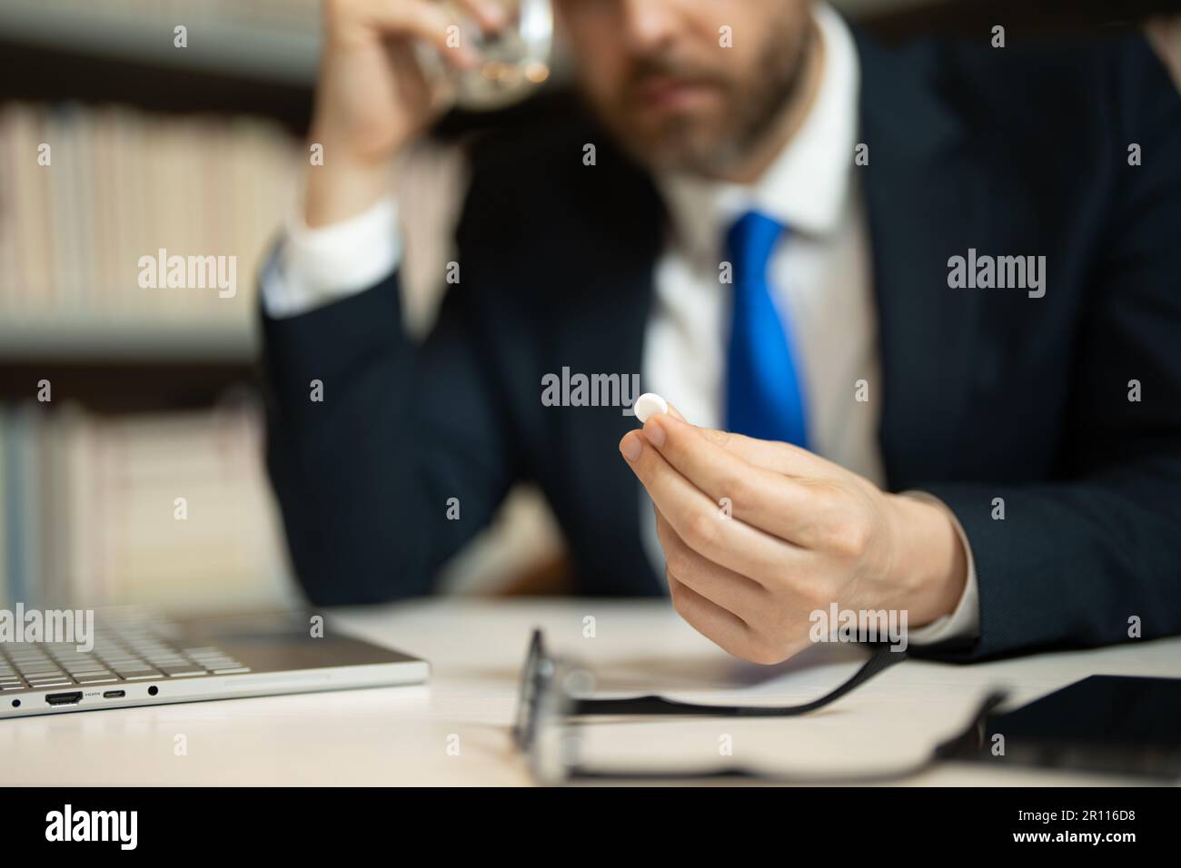 Tired, headache and eye strain on laptop. Man with stress, burnout and ...