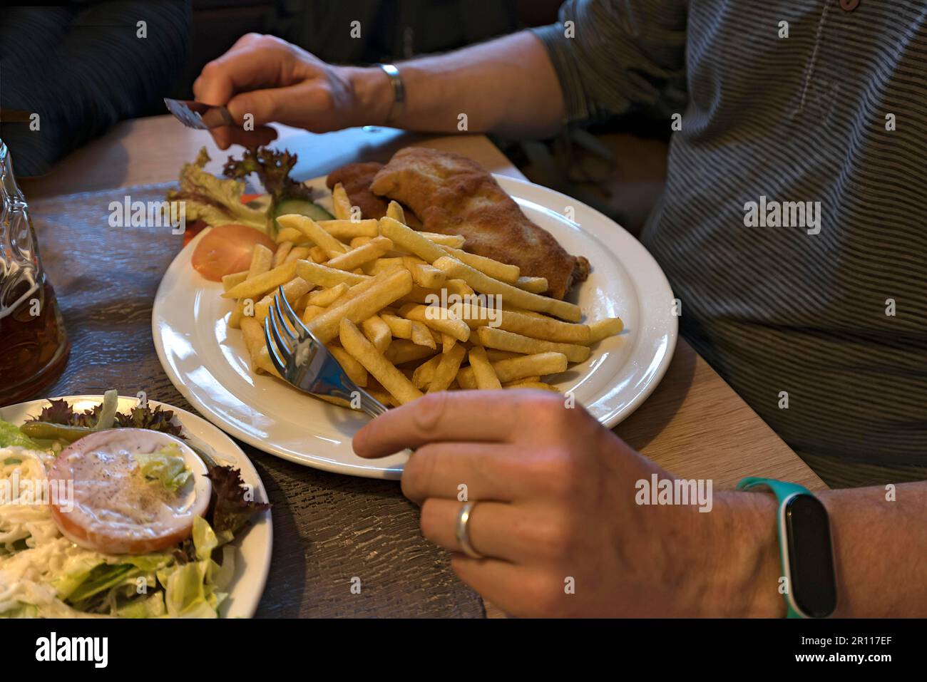 Wiener Schnitzel with french fries, Bavaria, Germany Stock Photo