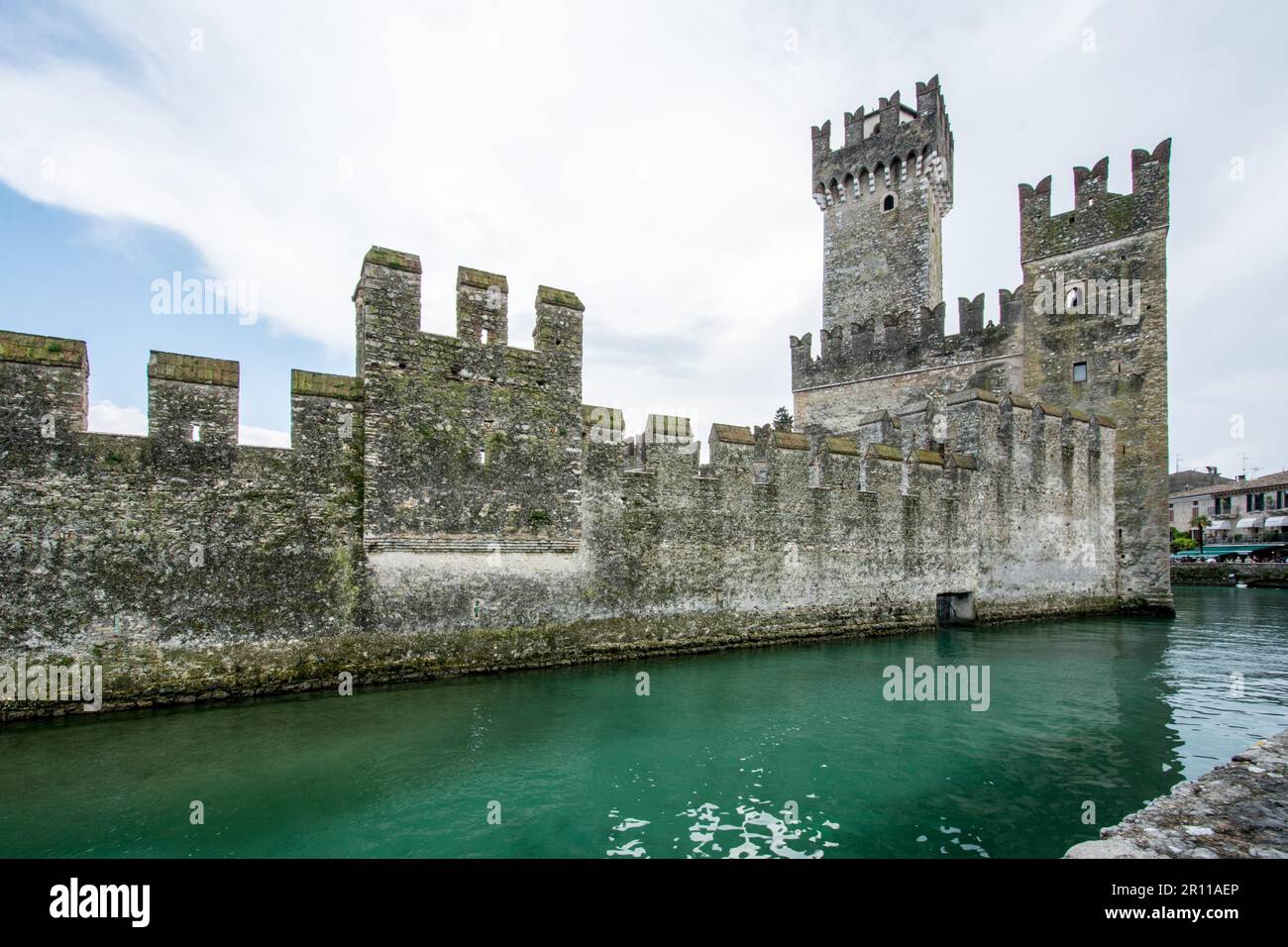 SIRMIONE, ITALY, APRIL 23: The Scaliger Caslte in Sirmione, Italy on April 23, 2014. The famous castle was built in the 13th century. Foto taken from Stock Photo