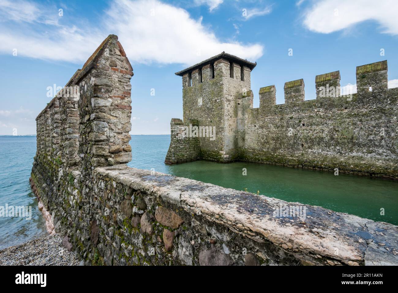 SIRMIONE, ITALY, APRIL 23: The Scaliger Caslte in Sirmione, Italy on April 23, 2014. The famous castle was built in the 13th century. Foto taken from Stock Photo