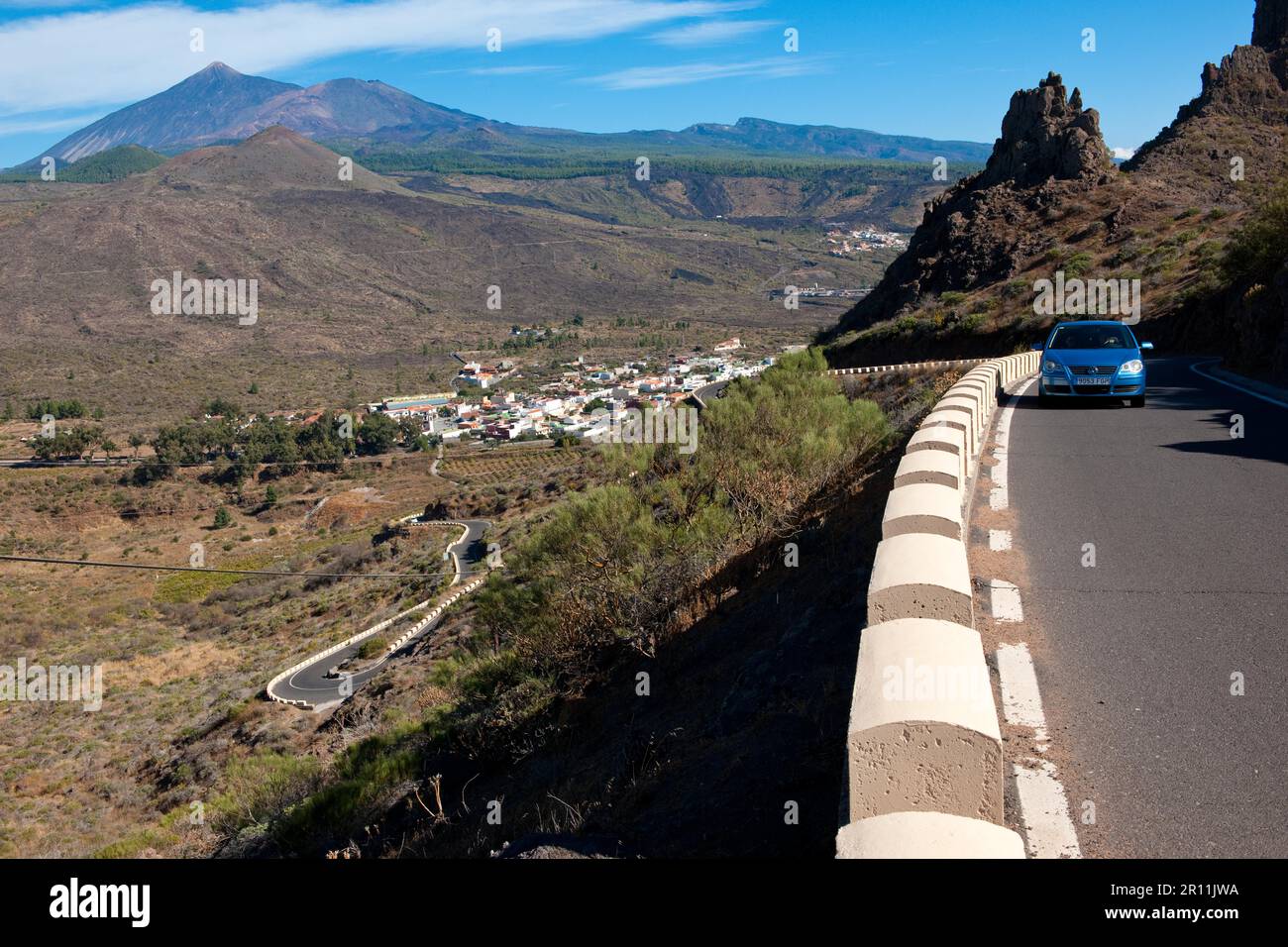 Car on Serpentine Road in Masca Valley, curves, Tenerife, Spain, Canary Islands Stock Photo