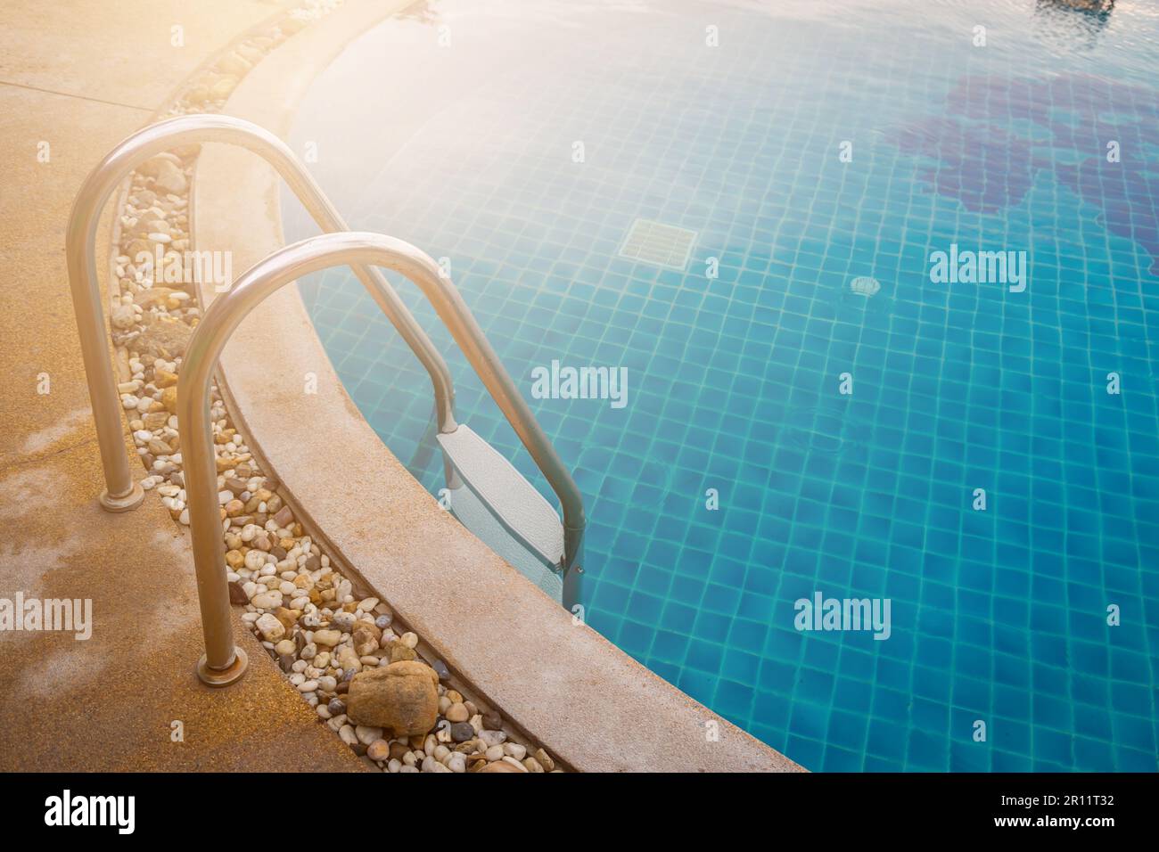 swiming pool with blue water background Stock Photo