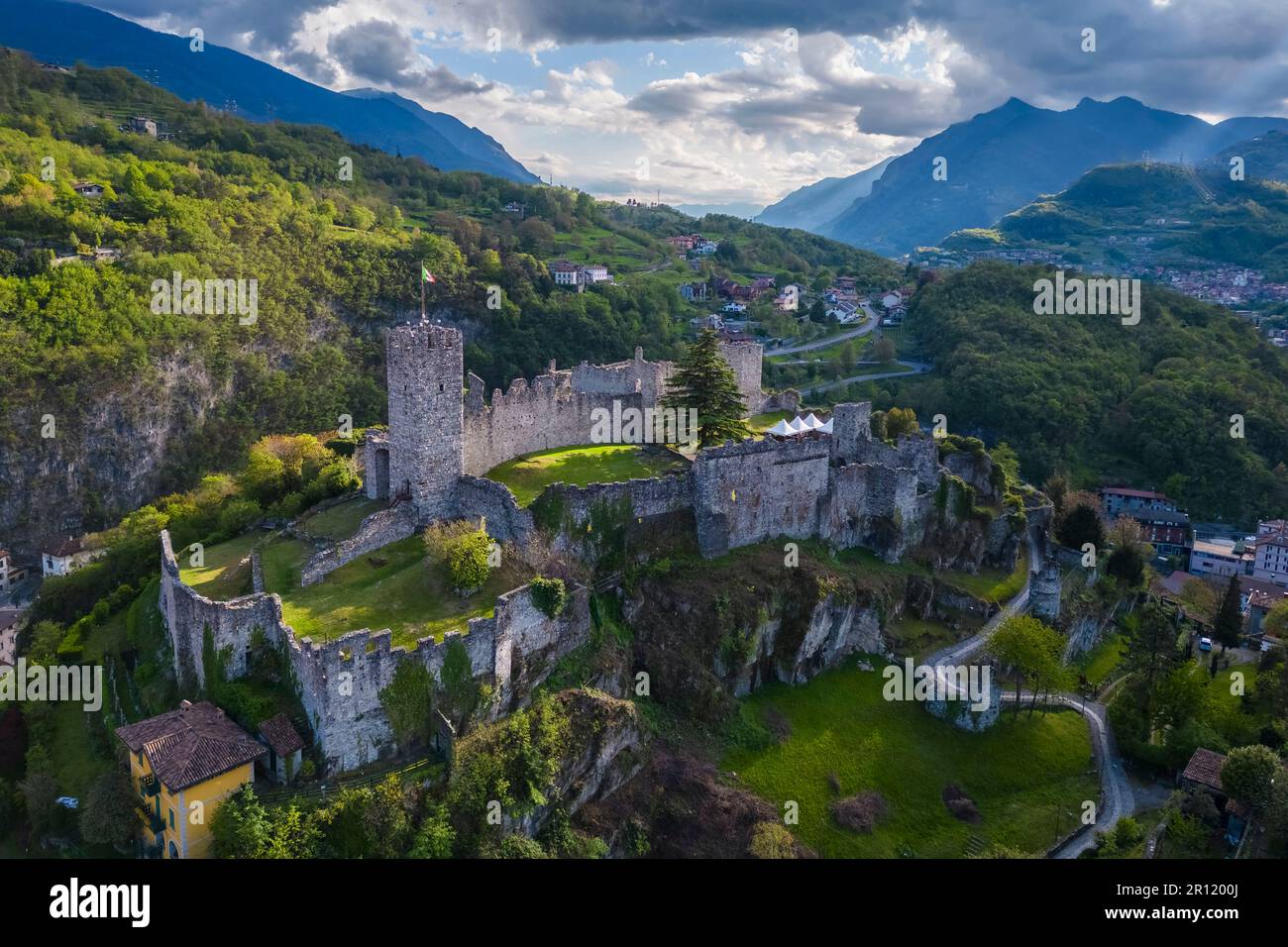 Aerial view of the ancient ruins of the castle of Breno. Brescia province, Valcamonica valley, Lombardy, Italy, Europe. Stock Photo