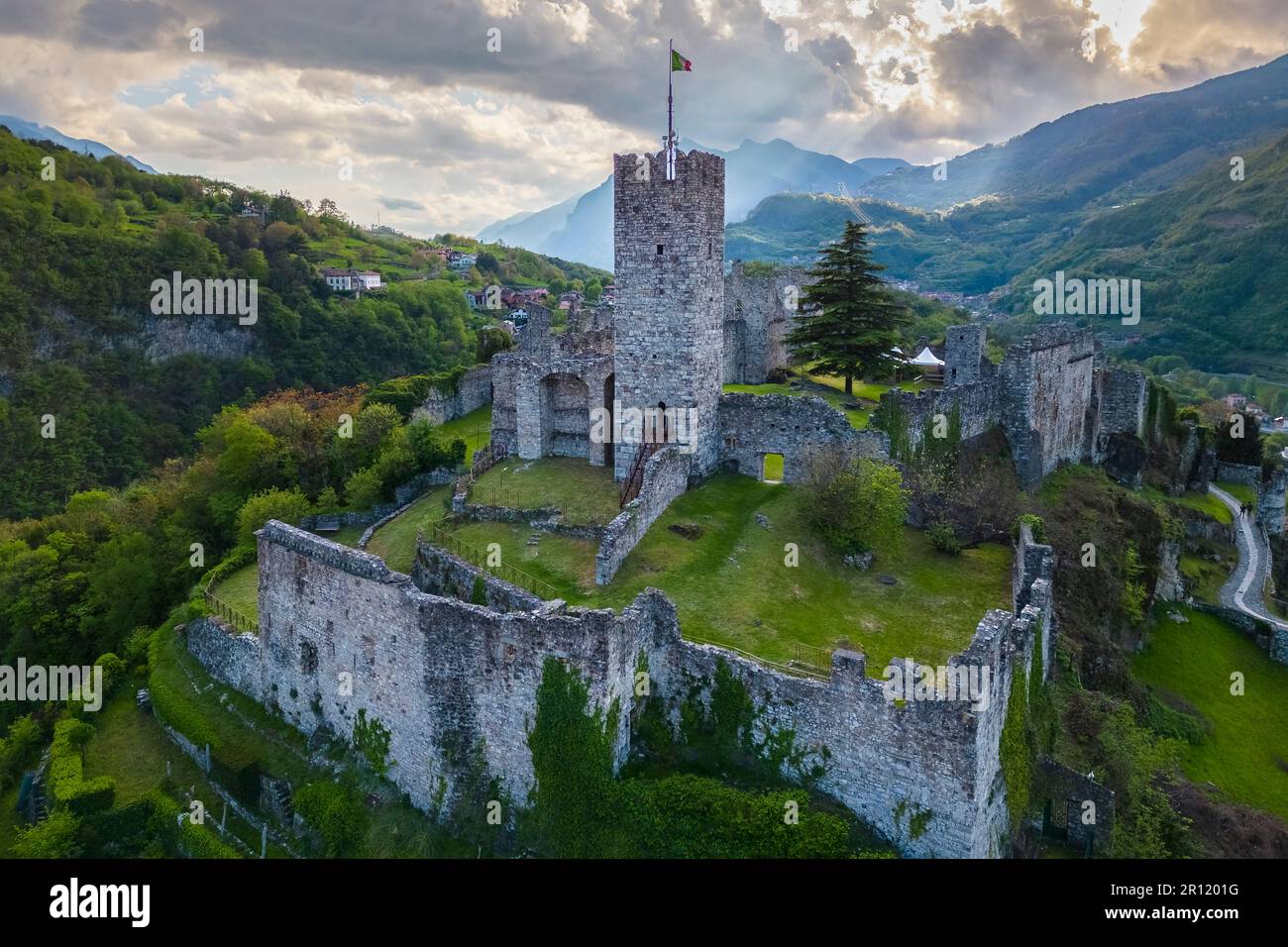 Aerial view of the ancient ruins of the castle of Breno. Brescia province, Valcamonica valley, Lombardy, Italy, Europe. Stock Photo
