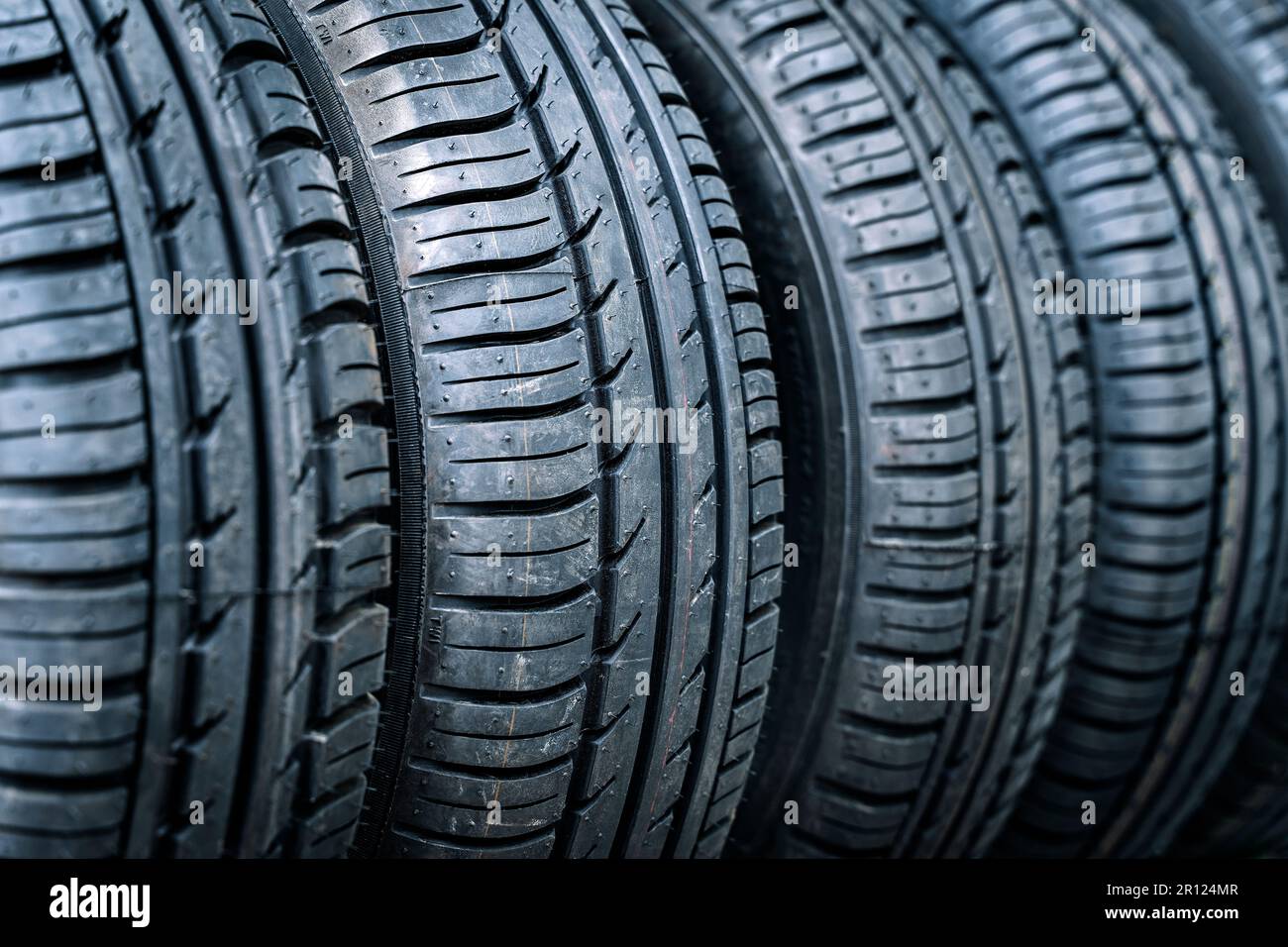 Car tires and wheels in a transport storage warehouse or car service