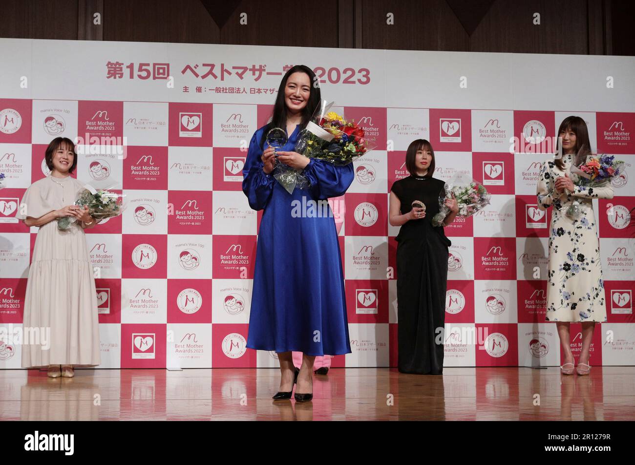 Japanese actress Yukie Nakama (2nd from L) attends a ceremony of Japan