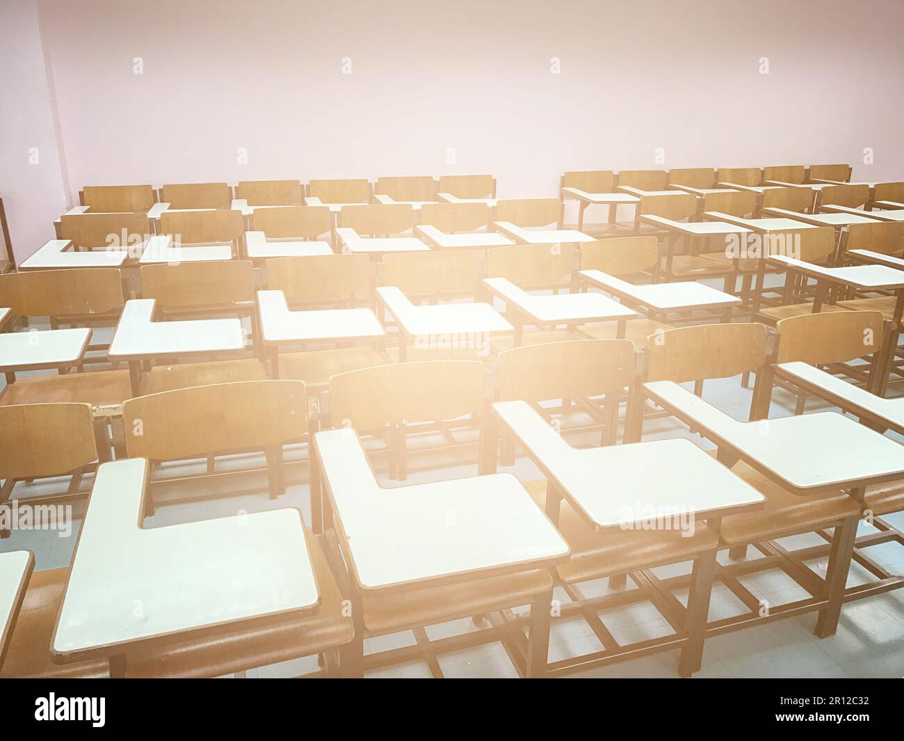 Wooden chairs in the classroom background Stock Photo - Alamy