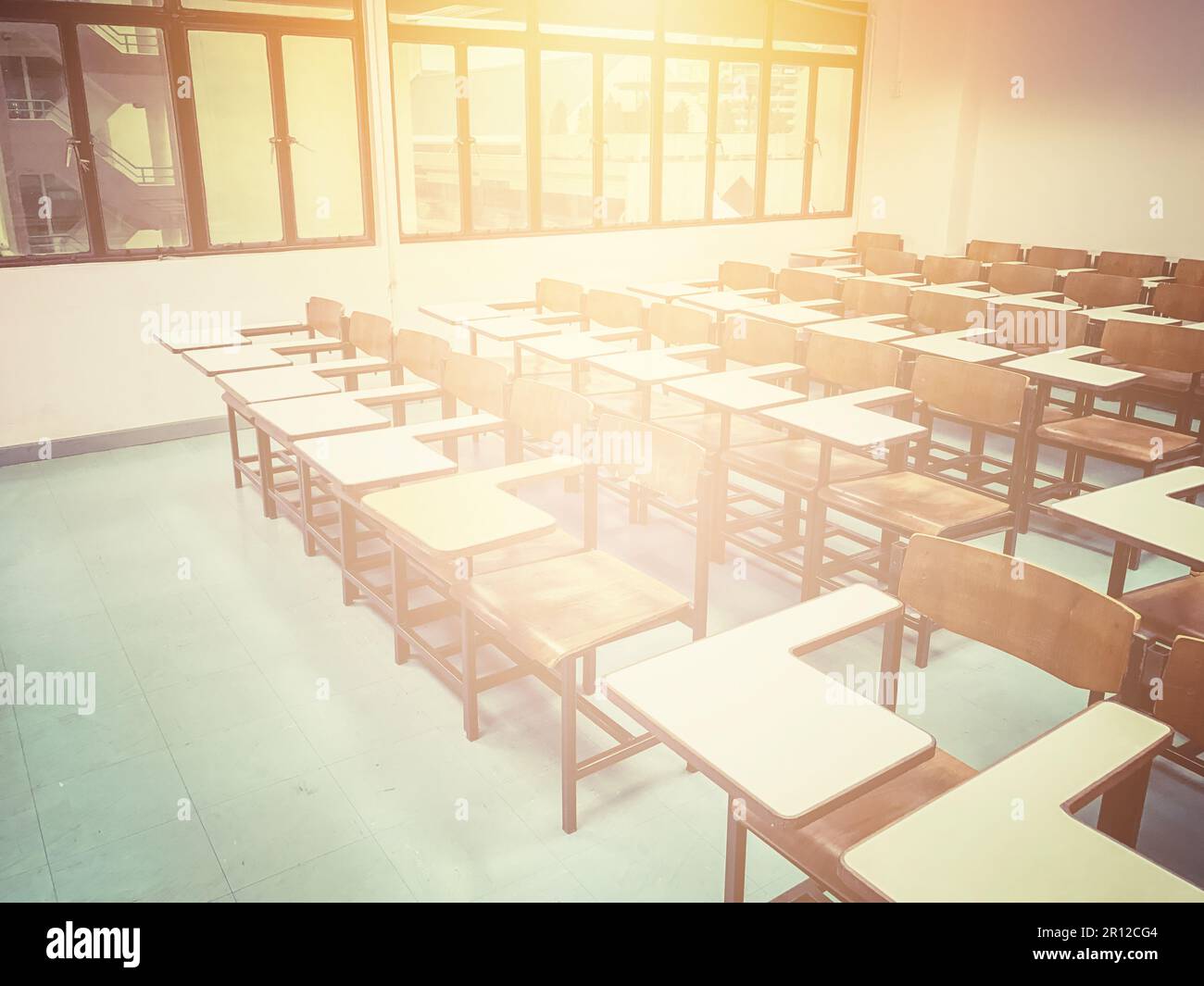 Wooden chairs in the classroom background Stock Photo - Alamy