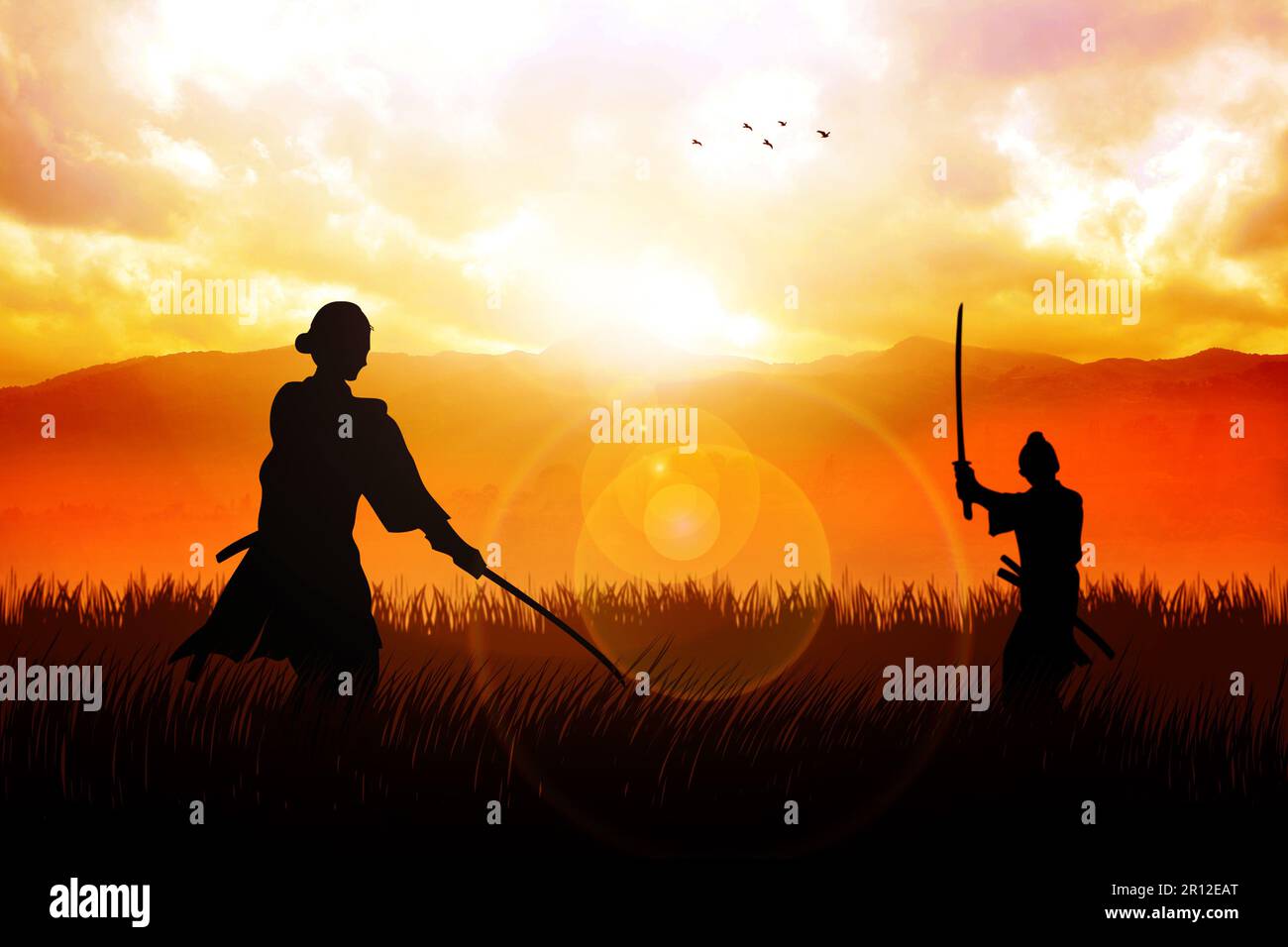 Two Samurai in duel stance facing each other on dramatic landscape Stock Photo