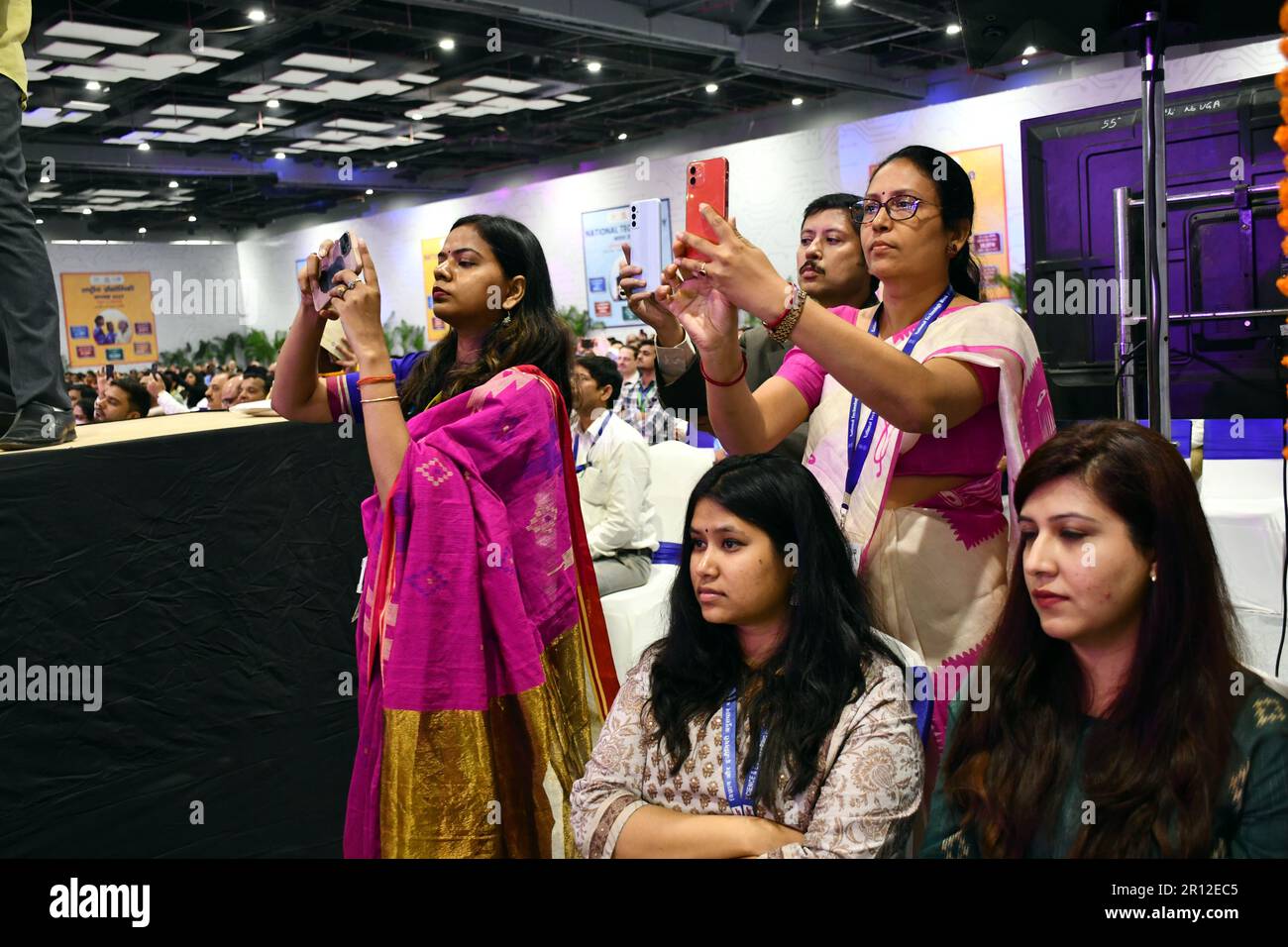 May 11, 2023, New Delhi, Delhi, India: Participants of national Technology Day listing and try to selfie with Prime Minister Narendra Modi who innaugrate the National Technology Day Celebrations with Defence Minister Rajnath Singh and Dr. Jitendra Singh, MoS (I/C) Science & Technology, Earth Sciences, MoS PMO, D/o Space, Atomic Energy, DoPT will also present in event and PM releases commemorative stamp & coin on the occasion also PM dedicate to the nation and lay foundation stone of nine projects, at Pragati Maidan, in New Delhi, (Credit Image: © Ravi Batra/ZUMA Press Wire) EDITORIAL USAGE ONL Stock Photo