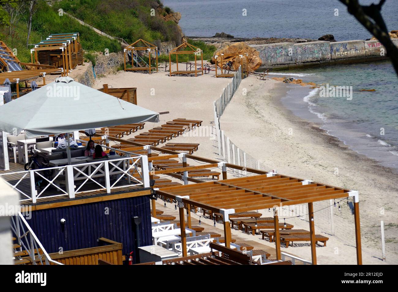 ODESA, UKRAINE - MAY 10, 2023 - The fence blocks access to the Black Sea as citizens are prohibited from staying on the beaches along the Black Sea co Stock Photo