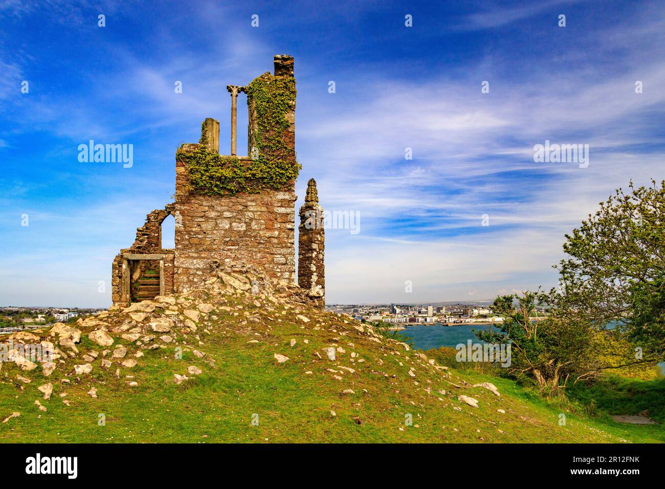The ruined Folly in Mount Edgcumbe Country Park has views across Plymouth Sound towards The Hoe and waterfront, Cornwall, England, UK Stock Photo