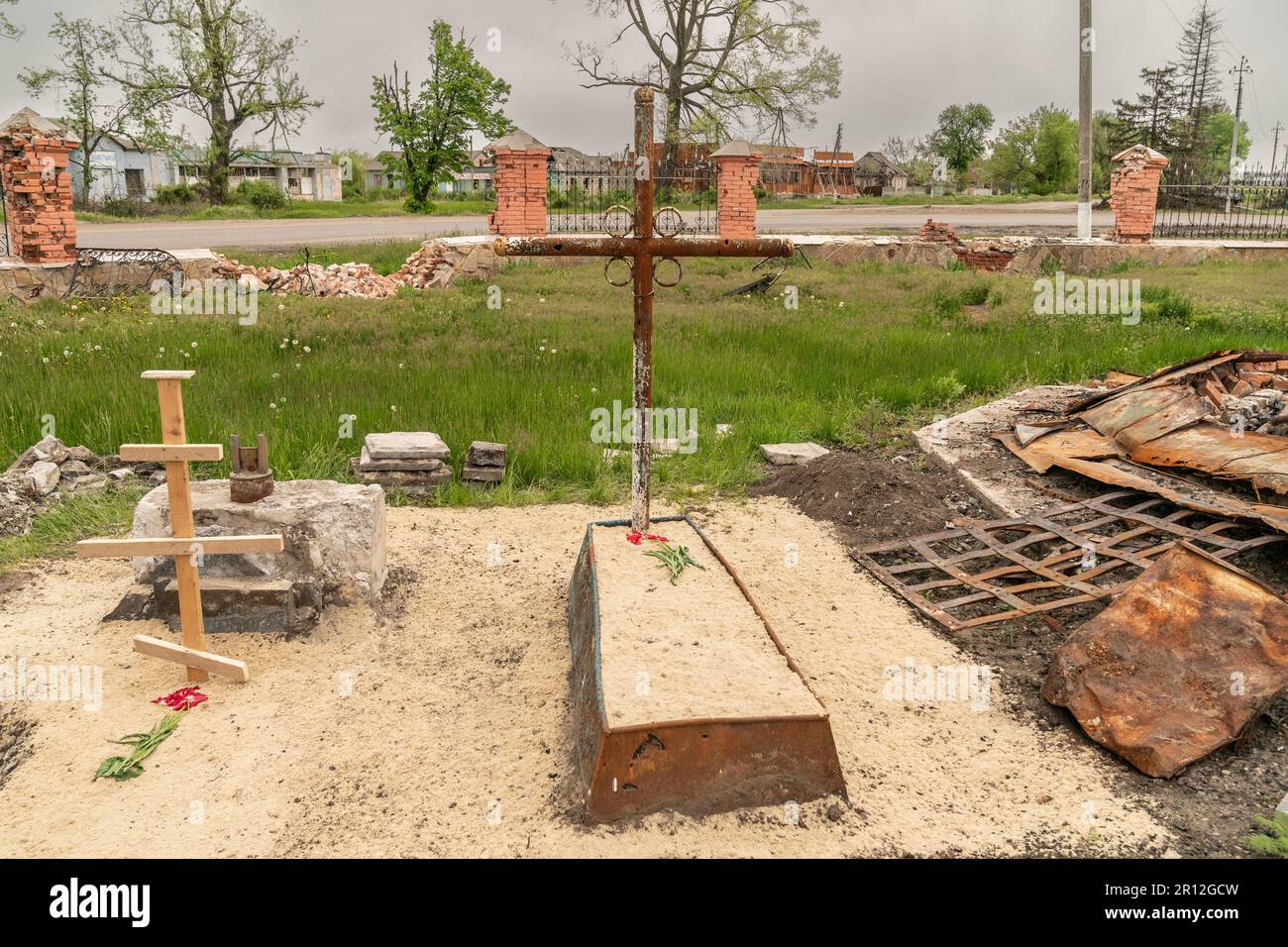 Two graves on the ground of completely destroyed church known as ...