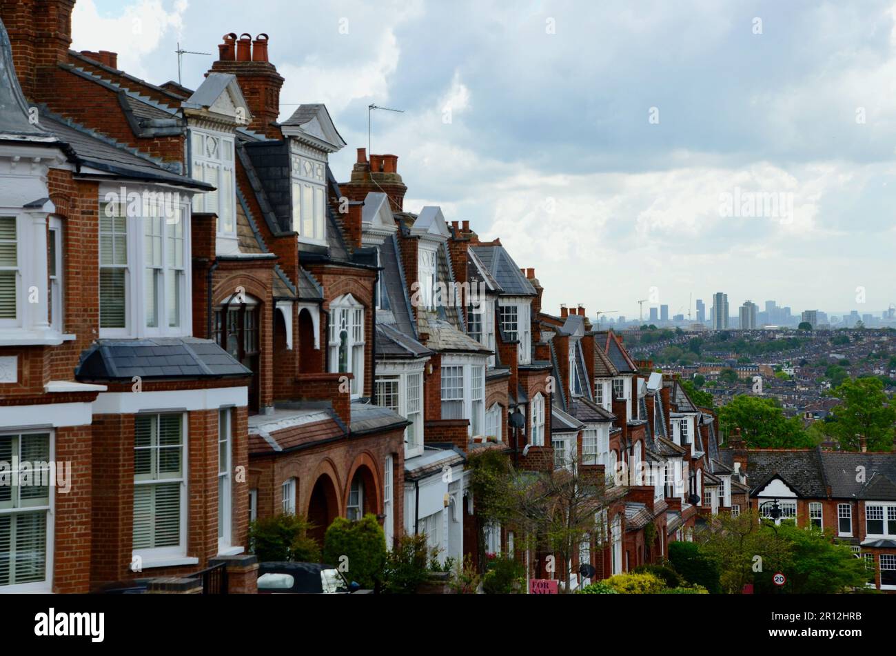 view of london skyline with olympic park and canary wharf distant from