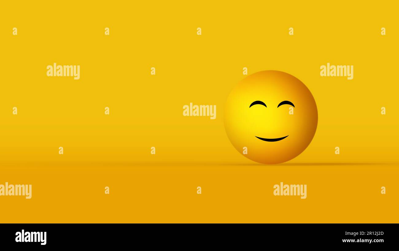 A cheerful emoji on yellow background with copyspace Stock Photo