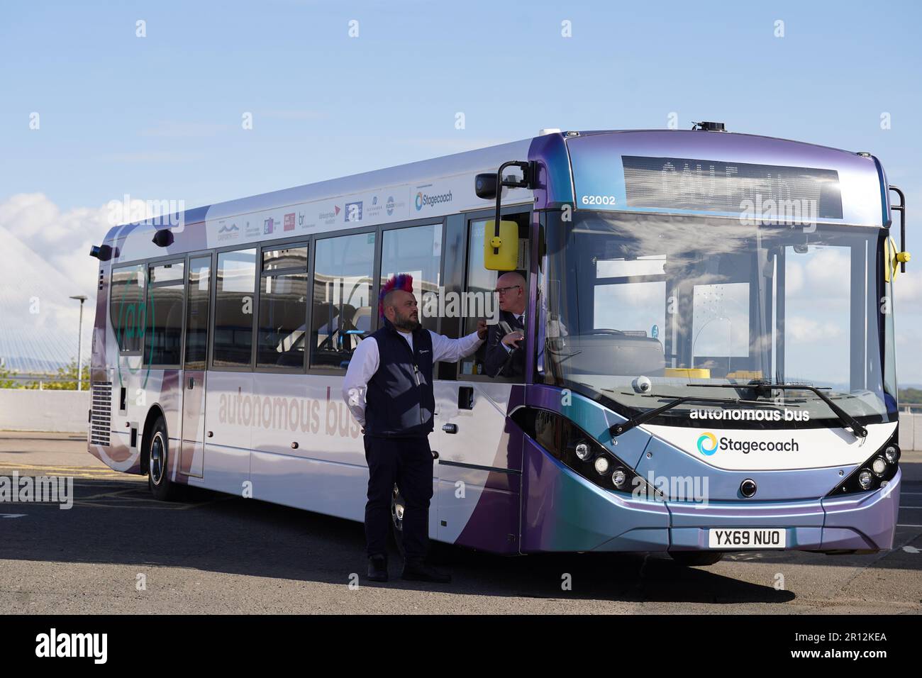 Minister for Transport Kevin Stewart (right) and Stuart Doidge with one