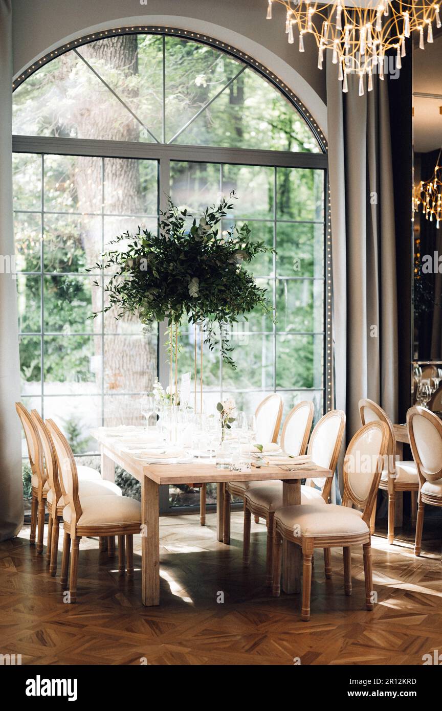 A beautiful wedding table setup with vibrant floral decorations Stock ...