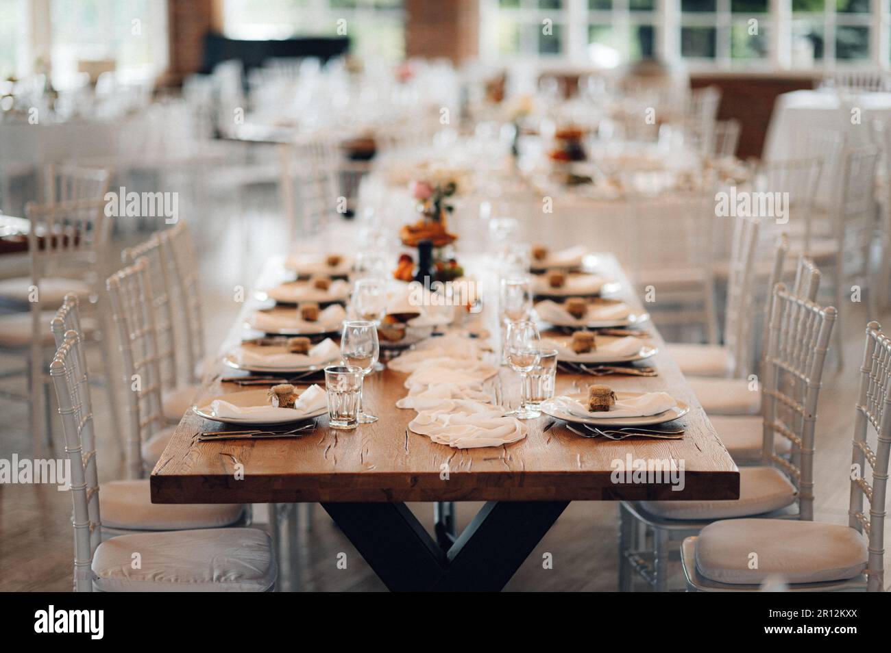 A beautiful wedding table setup with vibrant floral decorations Stock ...