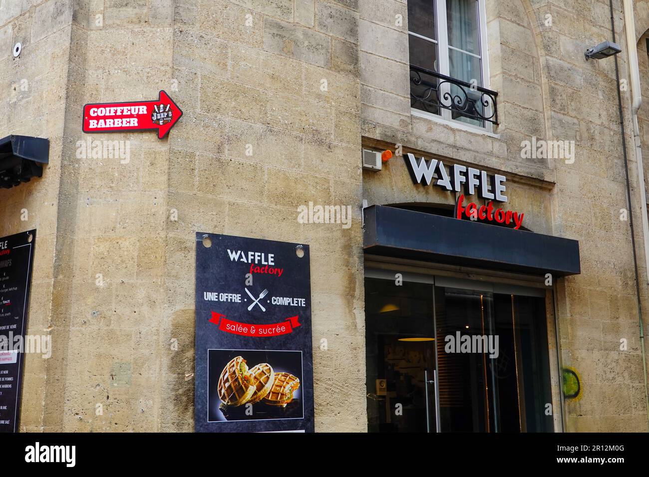 Waffle Factory, Belgian fast-food restaurant featuring sweet and savory waffles made daily on site with fresh ingredients, Sainte-Catherine Street. Stock Photo