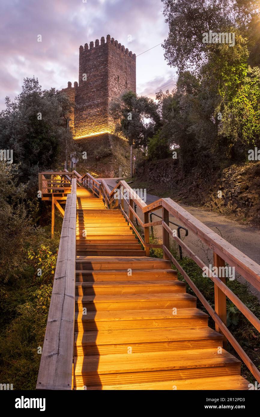 Lousã castle or Arouce castle, in Portugal, at dusk with the stairs of the Lousã walkways in the foreground. Stock Photo