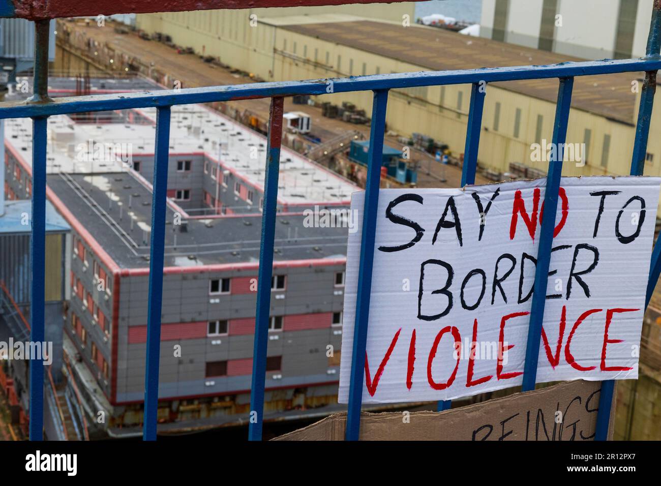 The Falmouth community holds an emergency protest in solidarity with refugees as the controversial Bibby Stockhold arrives in Port Stock Photo