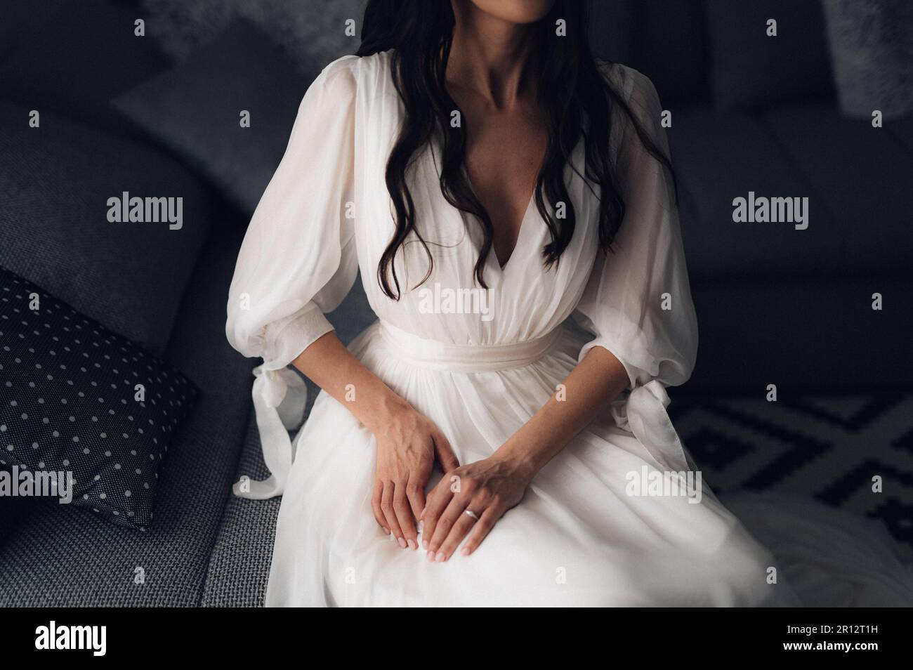 Bride sitting on couch hi-res stock photography and images - Alamy