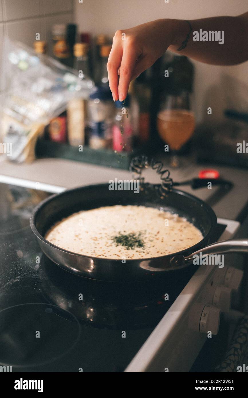 Cooking on stovetop wooden hi-res stock photography and images - Alamy
