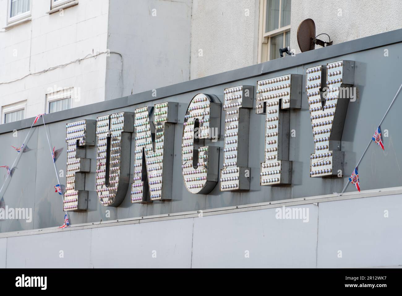 Sign above the amusement or slots arcade, 'Fun City' in the town of Whitby, North Yorkshire, UK. Stock Photo