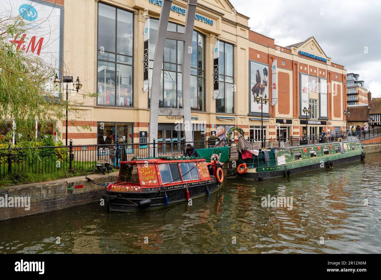 Narrow boats outside Waterside Shopping Centre in the city of Lincoln, UK. Stock Photo