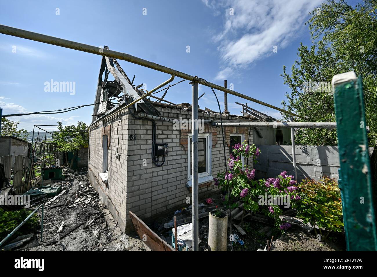 MALOKATERYNIVKA, UKRAINE - MAY 11, 2023 - A house damaged in the Russian MLRS attack is pictured in Malokaterynivka, Zaporizhzhia Region, southeastern Stock Photo