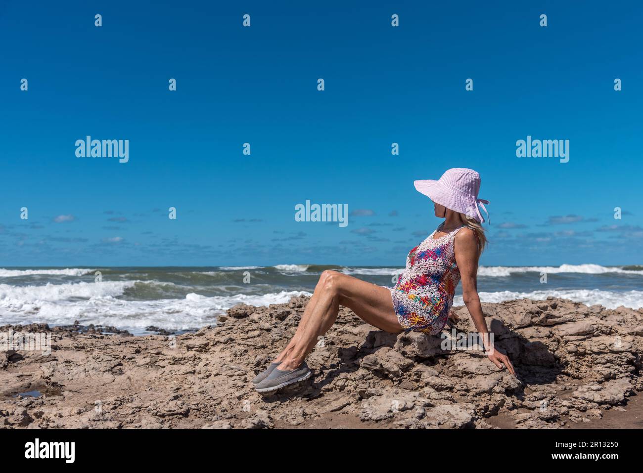 Carefree mature woman sunbathing hi-res stock photography and images ...