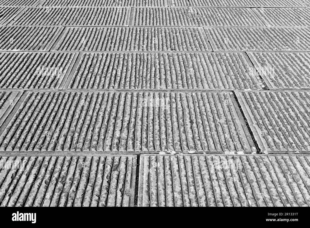 New paving made with stone blocks in an italian pedestrian zone Stock Photo Alamy