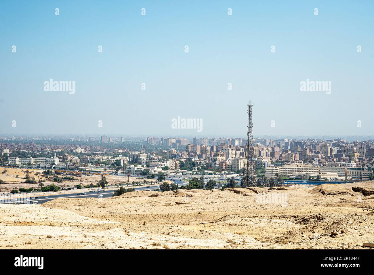 a modern suburb of Cairo, Giza. arab city, chaotic development. View Over Smoggy Slums Of Cairo. look over Cairo with its traditional egyptian buildin Stock Photo