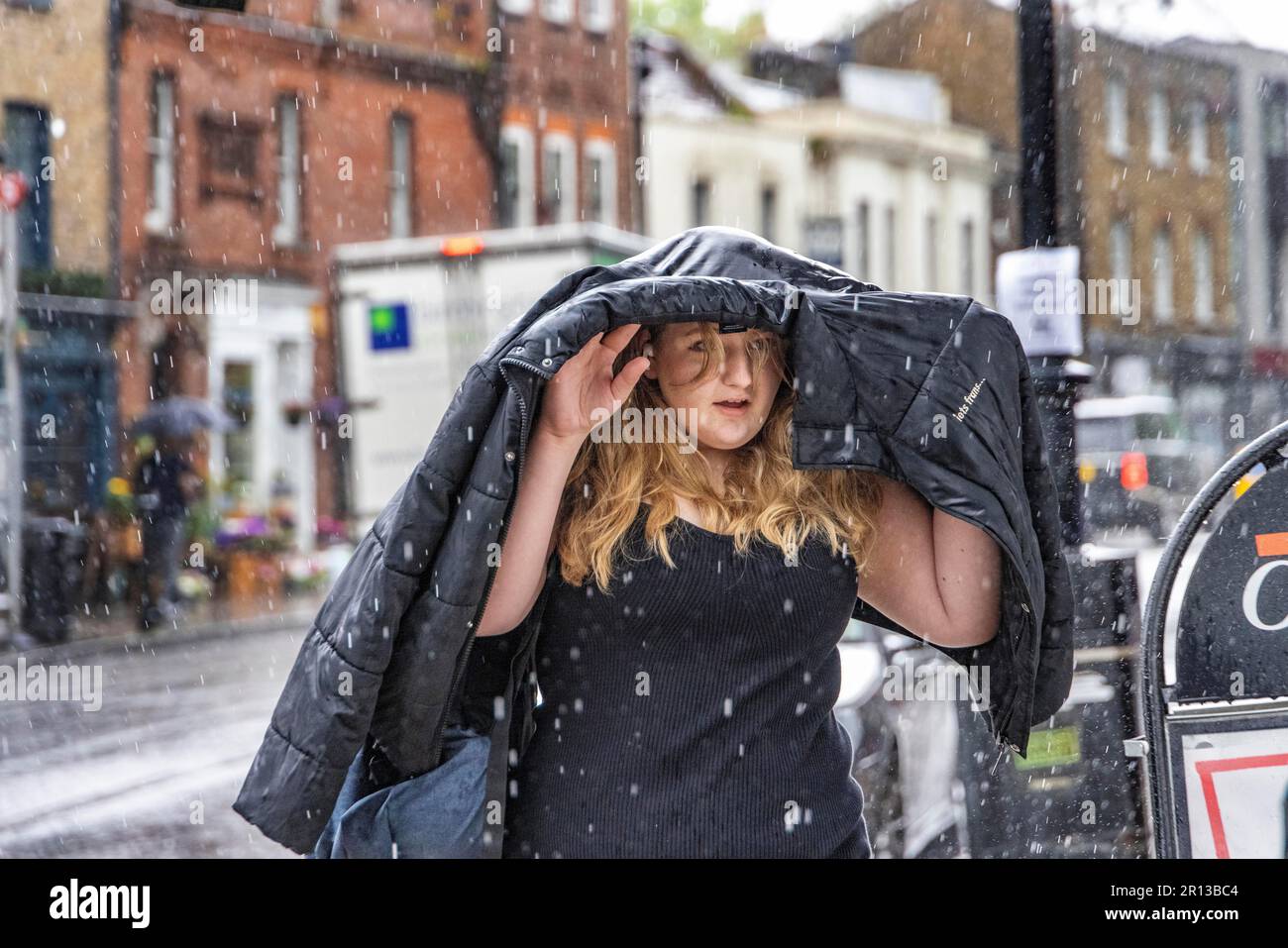 pic shows:  Wet weather  in Highgate North London today 11.5.23  Rain was falling in a flash thunderstorm as storm hit the weather as well as the hous Stock Photo