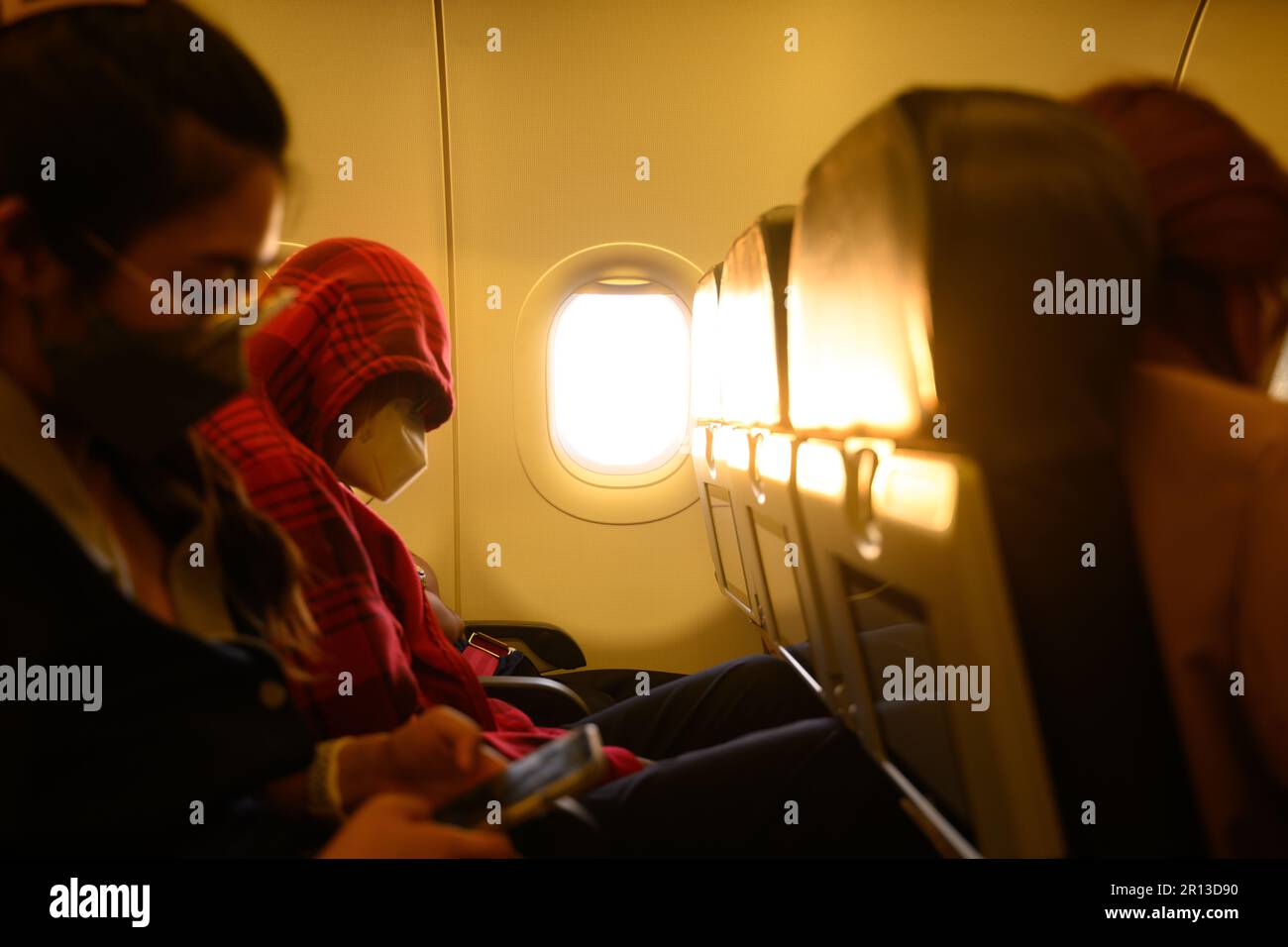 Airplane passengers happy hi-res stock photography and images - Alamy