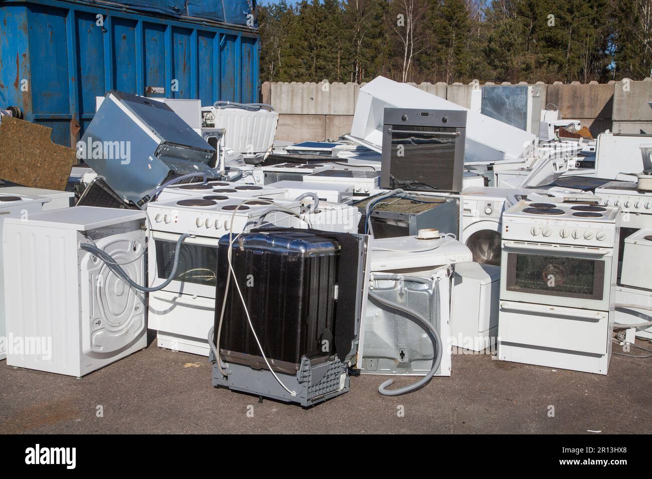 Replaced kitchen and washingmachines on landfill for recycling Stock Photo
