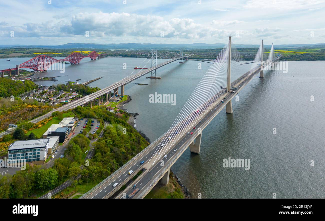 Aerial view of three bridges crossing the Fiver Forth at North Queensferry, Fife, Scotland, UK. Forth bridge (L), Forth Road bridge and Queensferry Cr Stock Photo