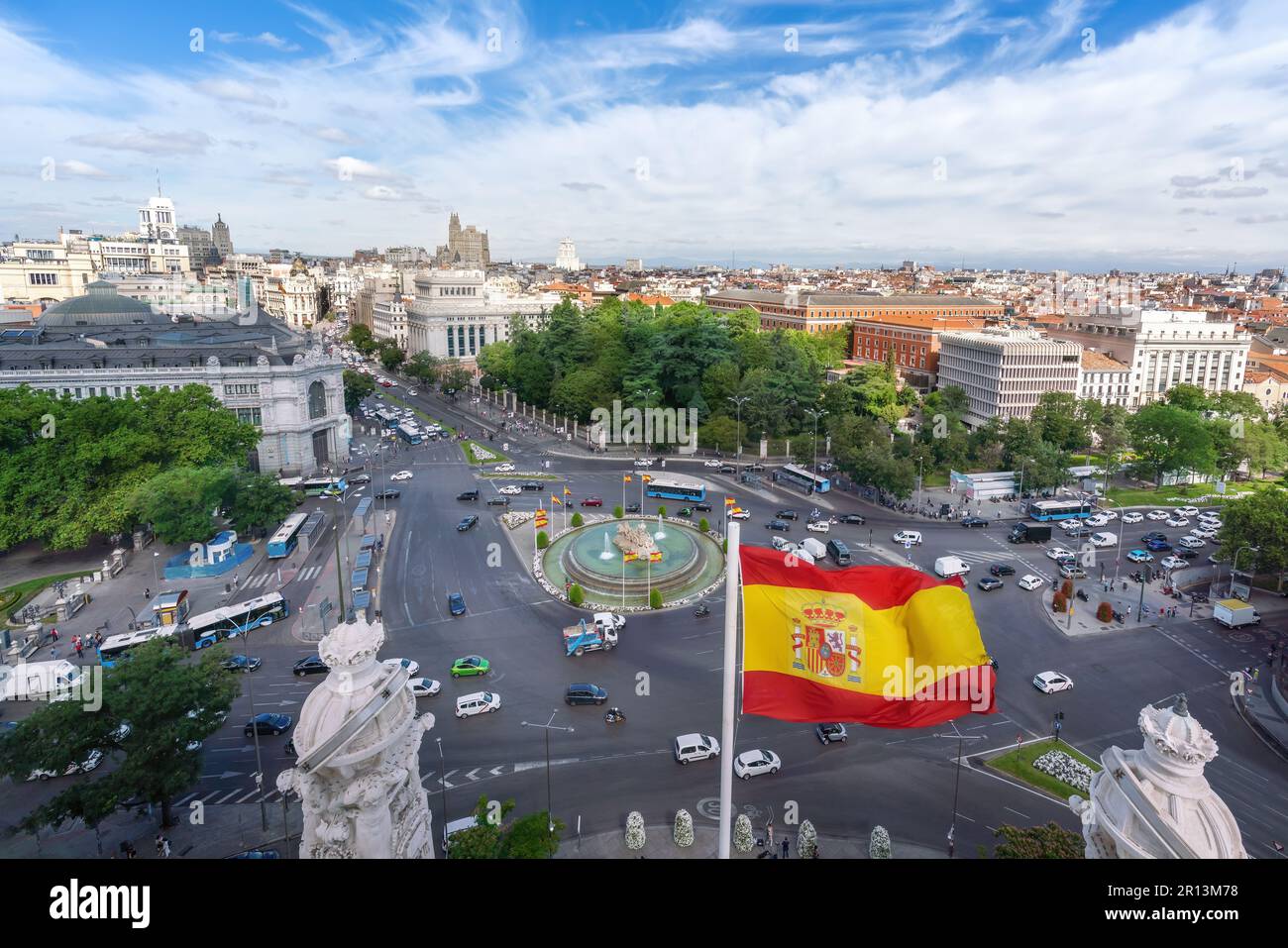Aerial view of Calle de Alcala Street and Plaza de Cibeles with the Spanish Flag - Madrid, Spain Stock Photo