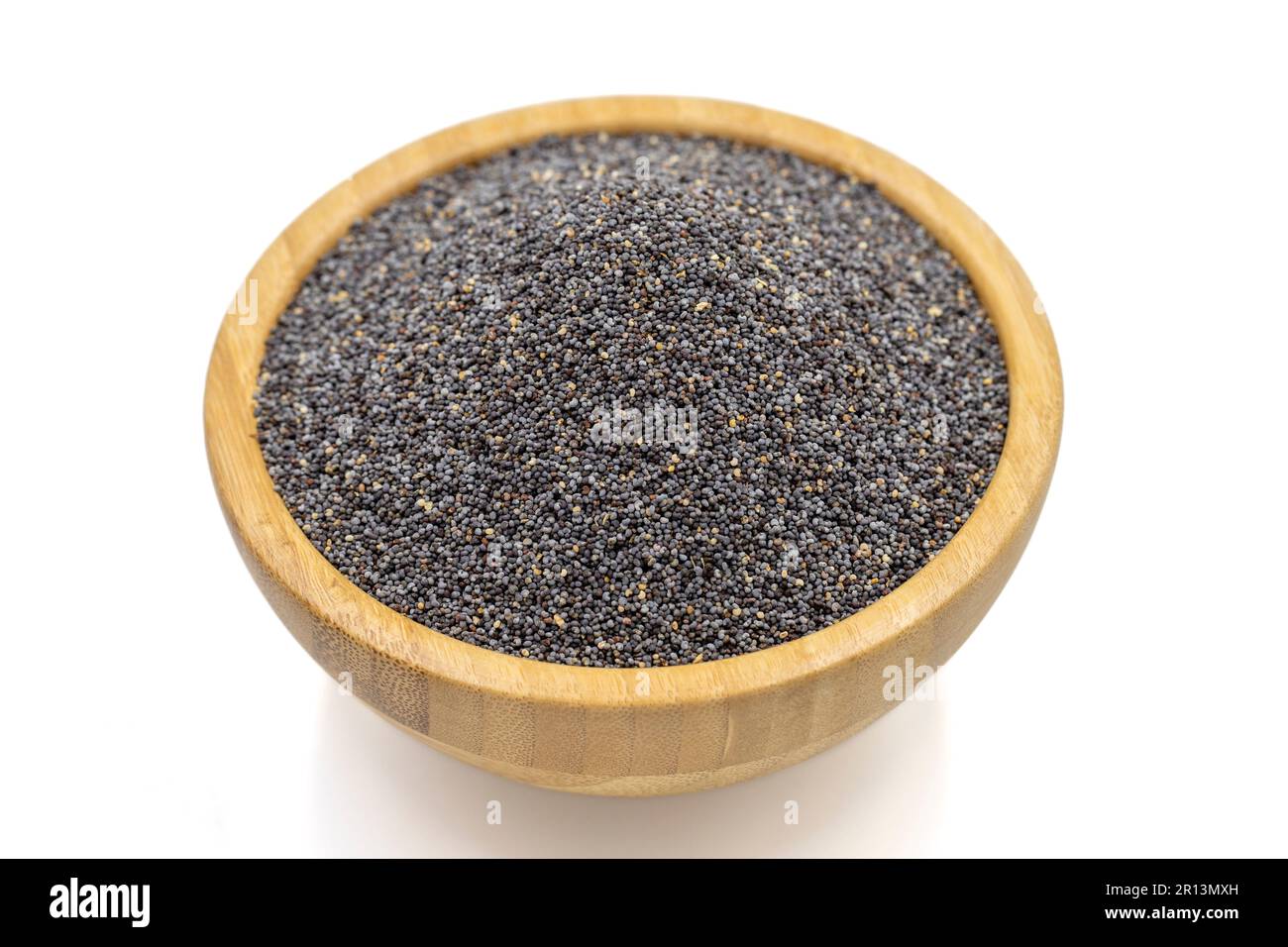 Blue poppy seeds. Spices concept. Blue poppy seeds isolated on white