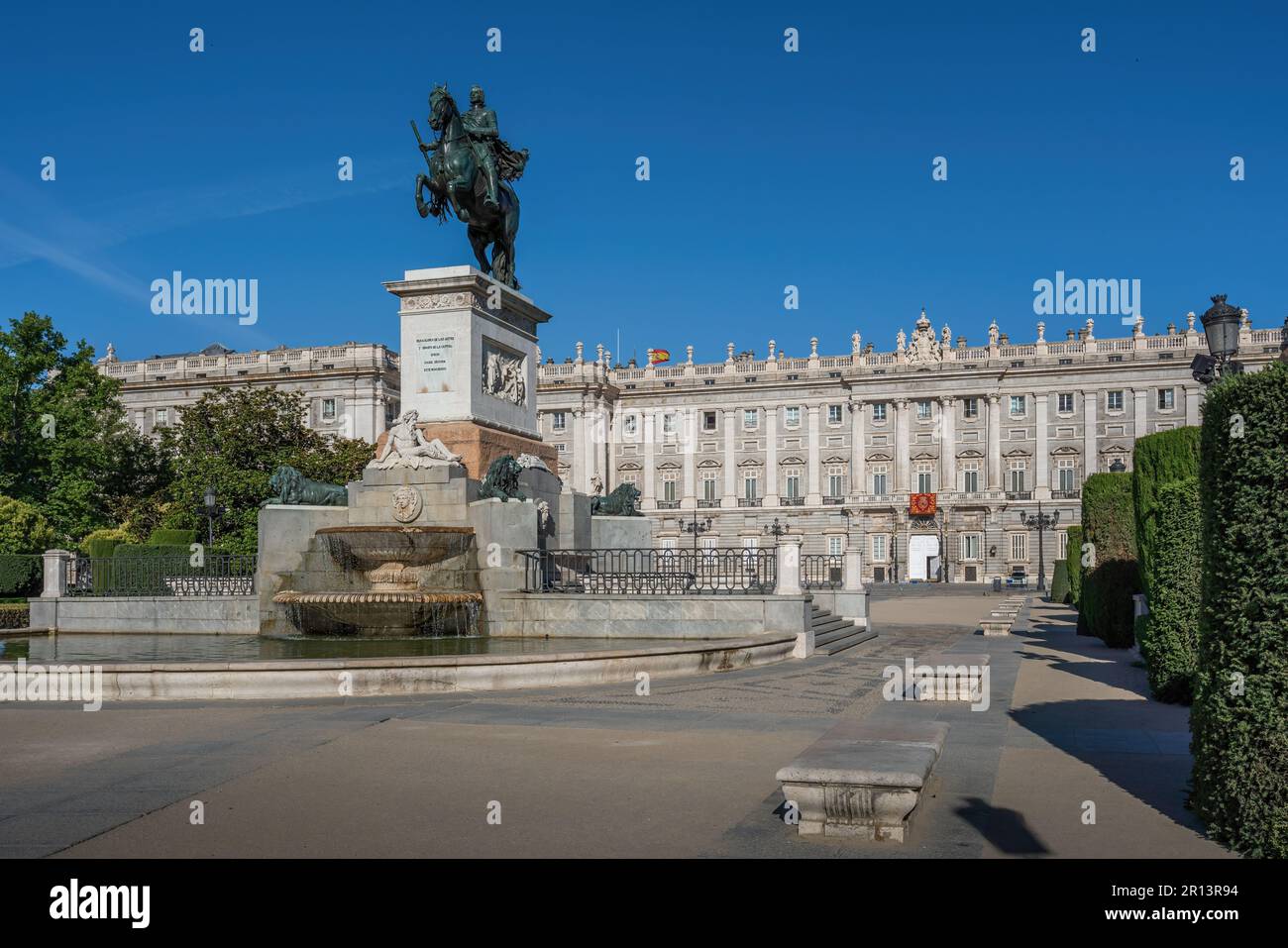 Plaza de Oriente Square with Monument to Philip IV (Felipe IV) and Royal Palace of Madrid - Madrid, Spain Stock Photo