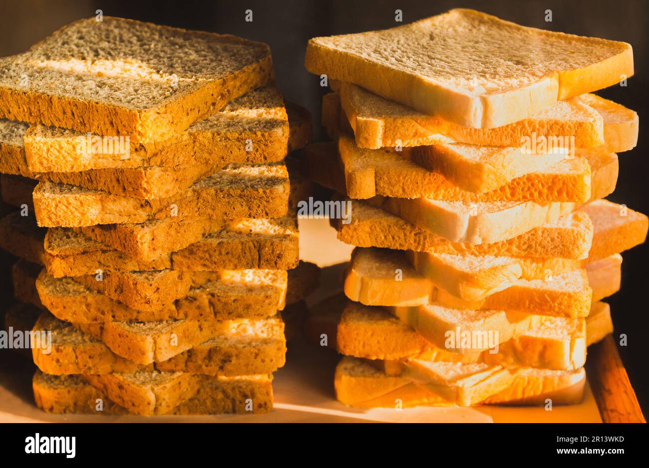 Nourishing Slices of freshly baked bread in kitchen Stock Photo Alamy