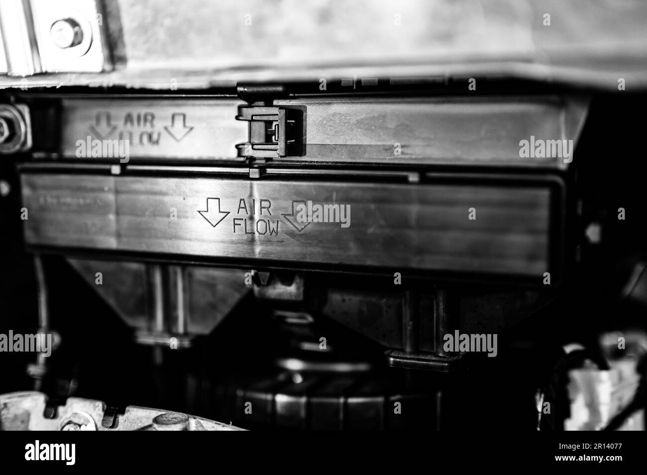 Automotive cabin air filter direction of flow arrow marked on casing