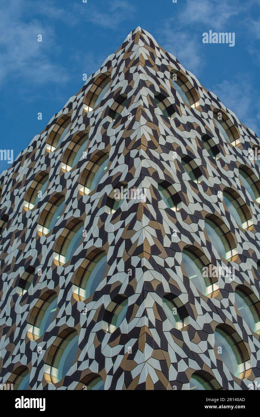 The geometrically patterned Ravensbourne University building with its unusual round windows. London, England Stock Photo