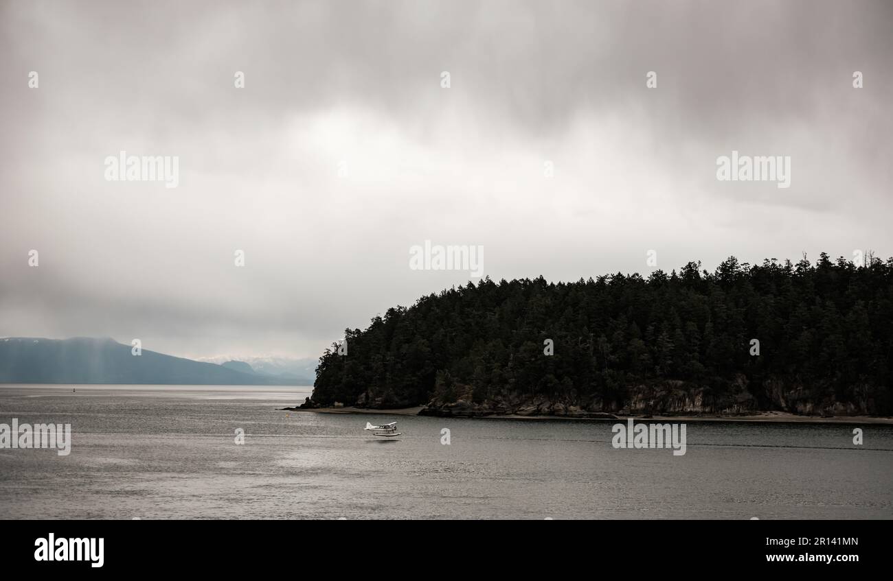 A float plane prepares to land on the water just off of Vancouver ...