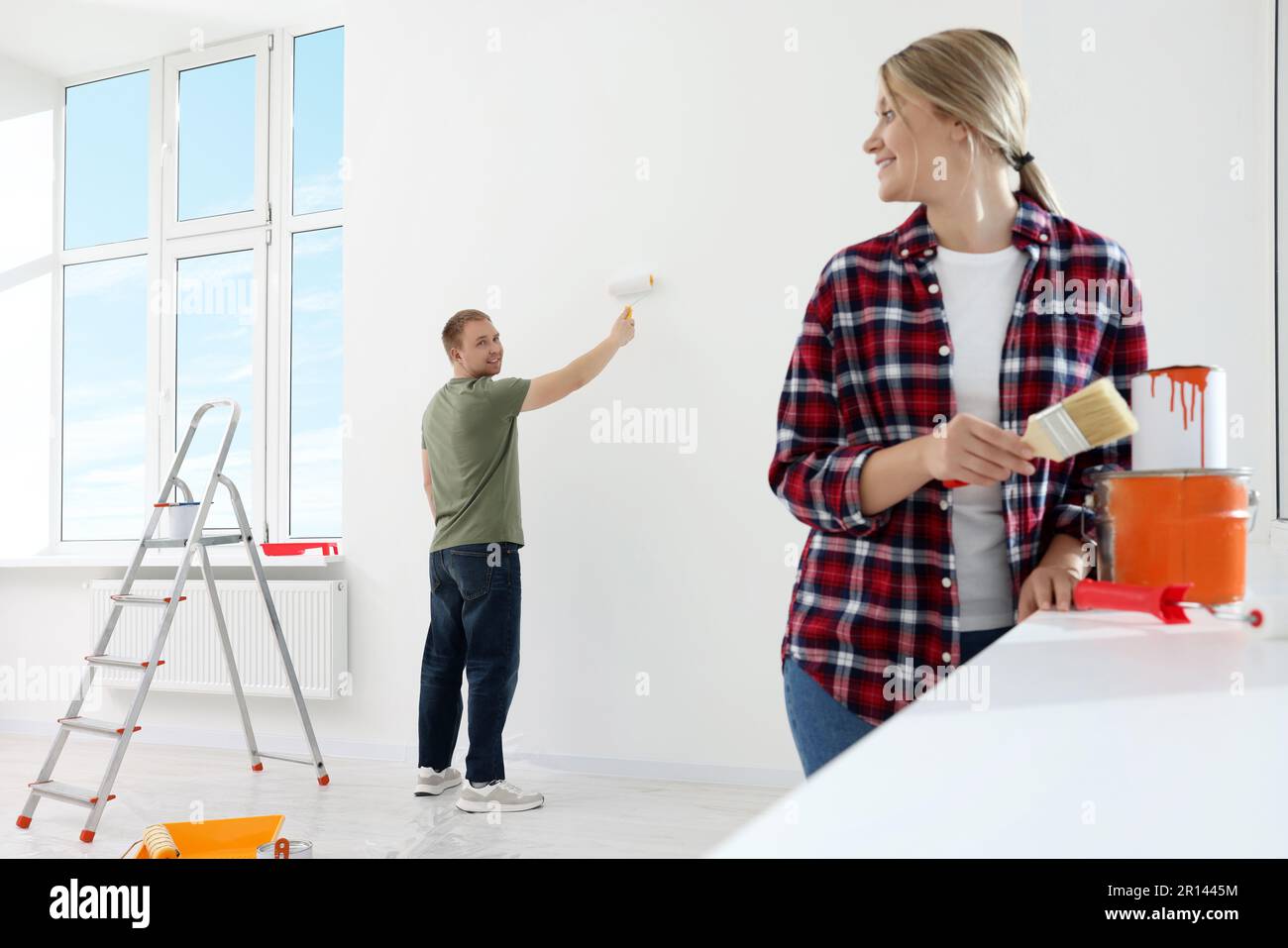 Photo inspiration: Visual Reference: DIY Maintenance Painting Couple Hi Res Stock Photography And Images