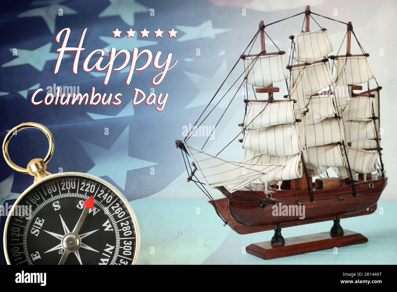 Happy Columbus Day. Beautiful ship model, compass and American flag Stock Photo