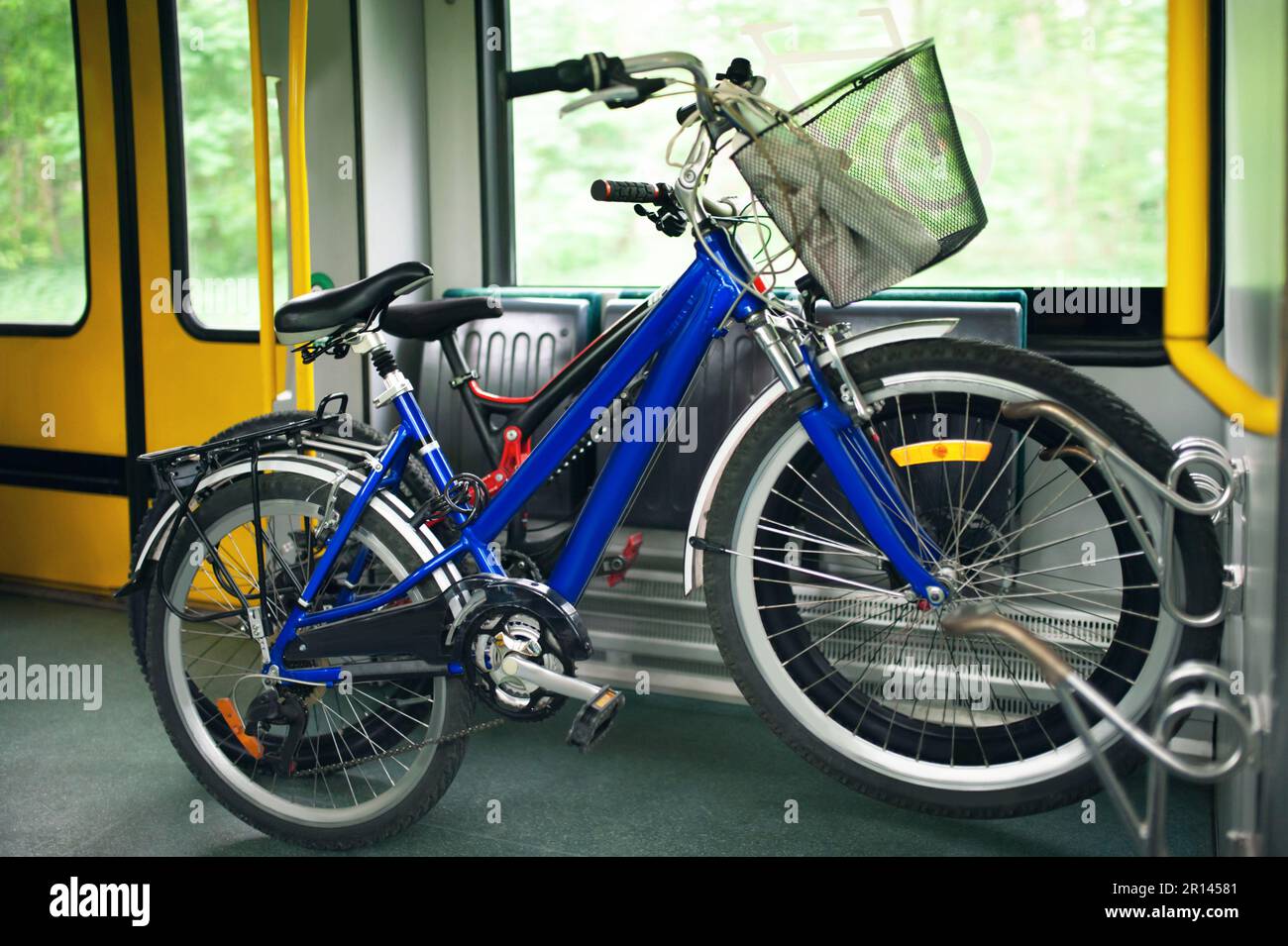 Different bicycles with big wheels in tram Stock Photo Alamy