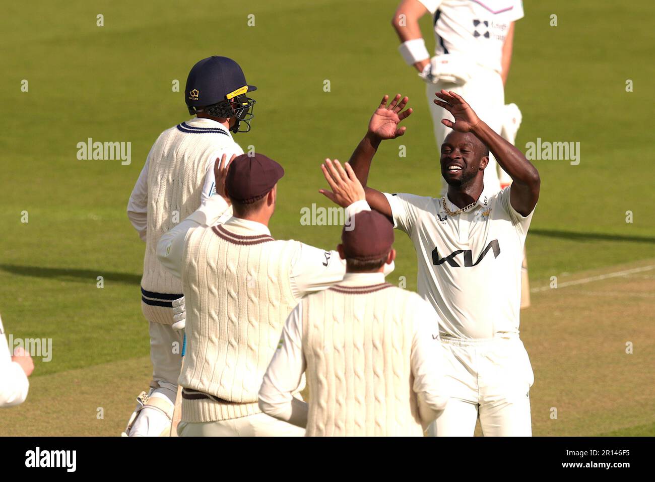 12 May, 2023. London, UK. Surrey’s Kemar Roach celebrates after getting the wicket of Middlesex’s Ryan Higgins as Surrey take on Middlesex in the County Championship at the Kia Oval, day two. David Rowe/Alamy Live News Stock Photo