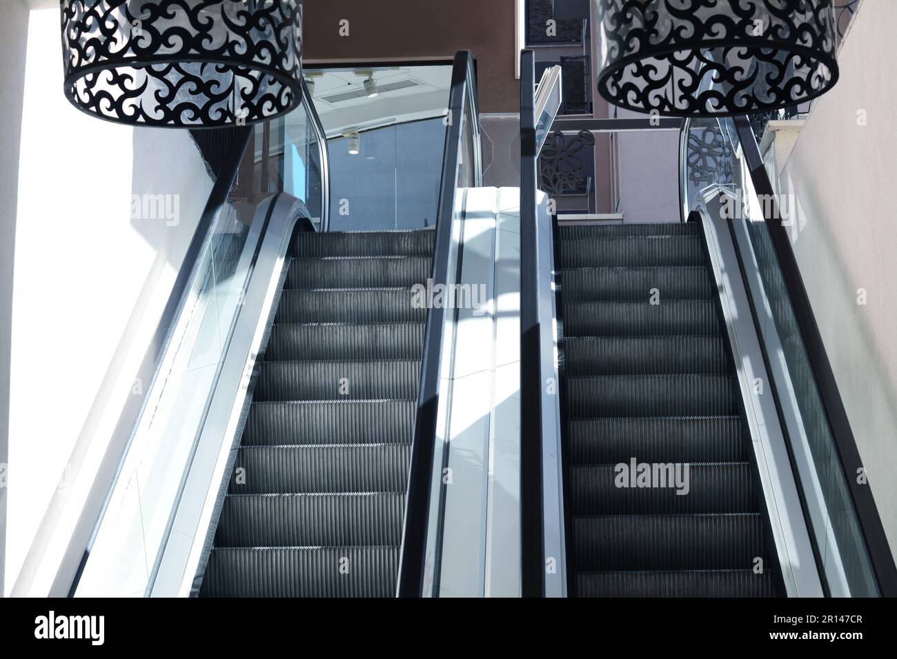 Mall Hand Rails Modern escalators with handrails in shopping mall Stock Photo - Alamy