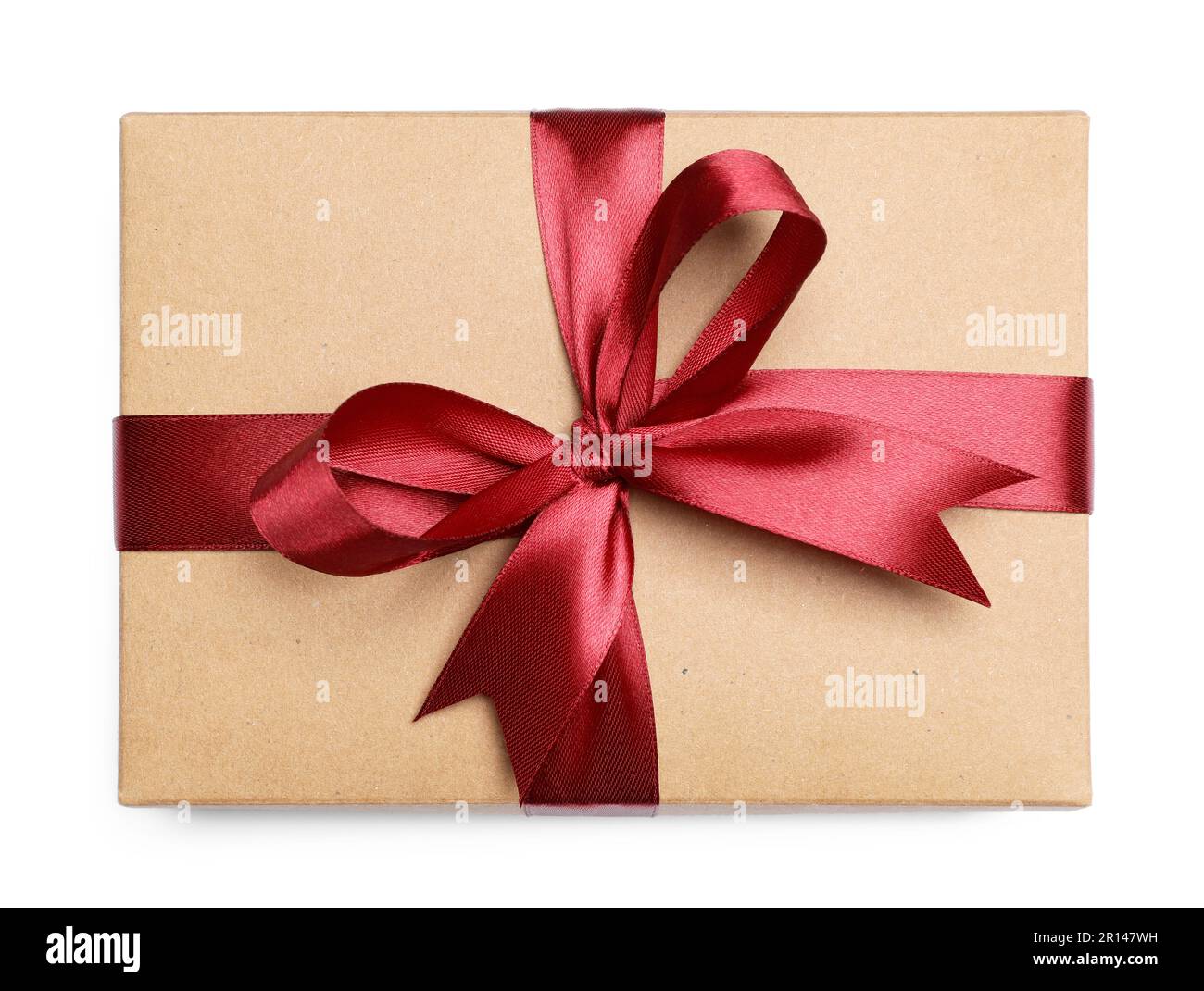 Christmas gift in kraft box with red ribbon isolated on white, top view Stock Photo